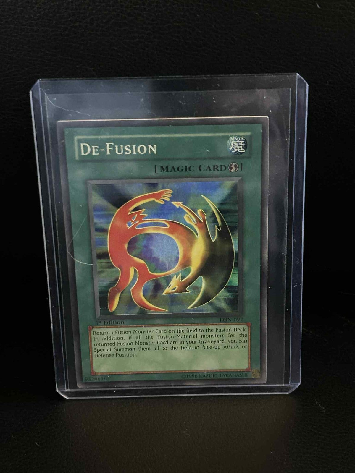 De-Fusion - LON-097 - Super Rare - 1st Edition Labyrinth of Nightmare Yu-Gi-Oh!