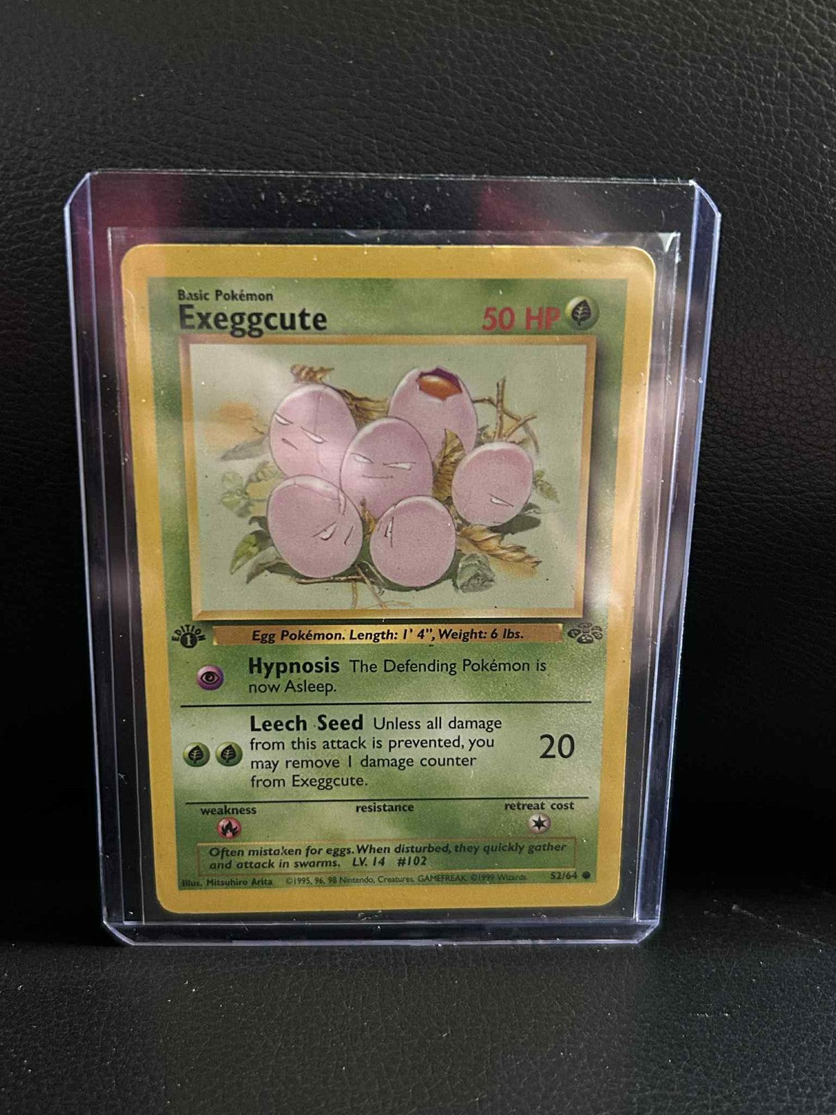 Exeggcute - 52/64 - Common - 1st Edition Jungle Pokemon Moderately Played, Engli