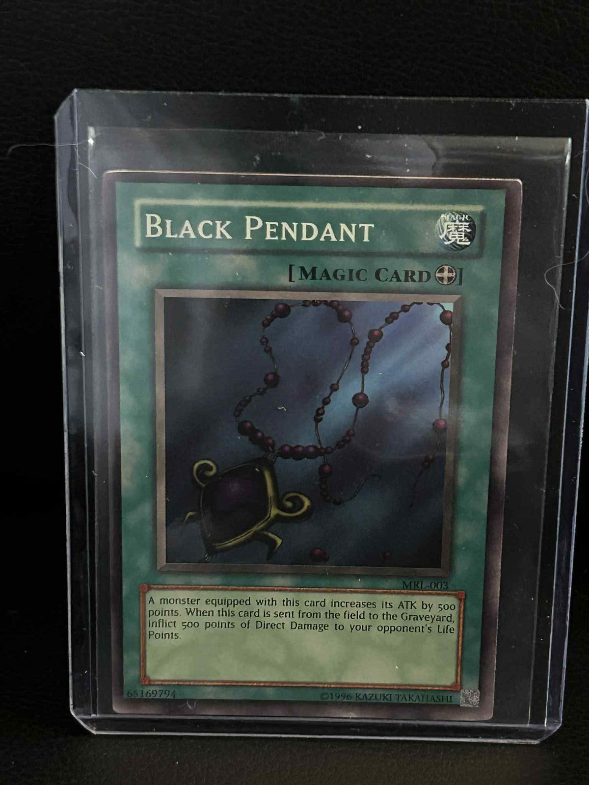 Black Pendant - MRL-003 - Super Rare - Unlimited Edition Magic Ruler Yu-Gi-Oh!