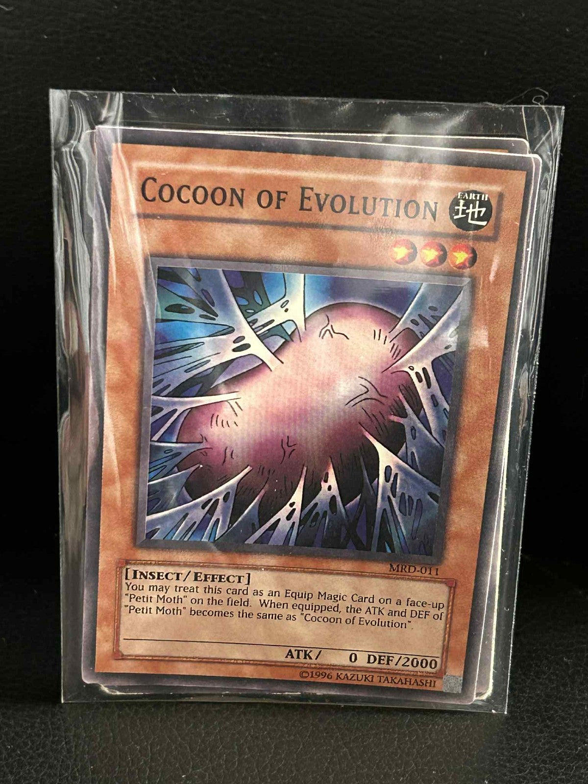 Cocoon of Evolution - MRD-011 - Common - Unlimited Edition Metal Raiders Yu-Gi-O