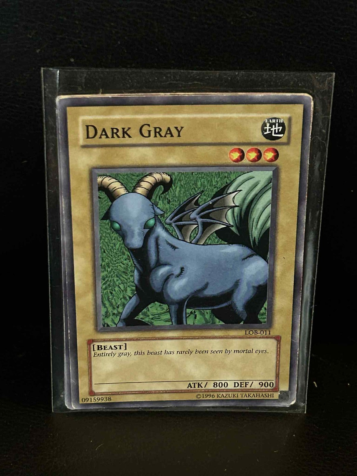 Dark Gray - LOB-011 - Common - Unlimited Edition Legend of Blue Eyes White Drago