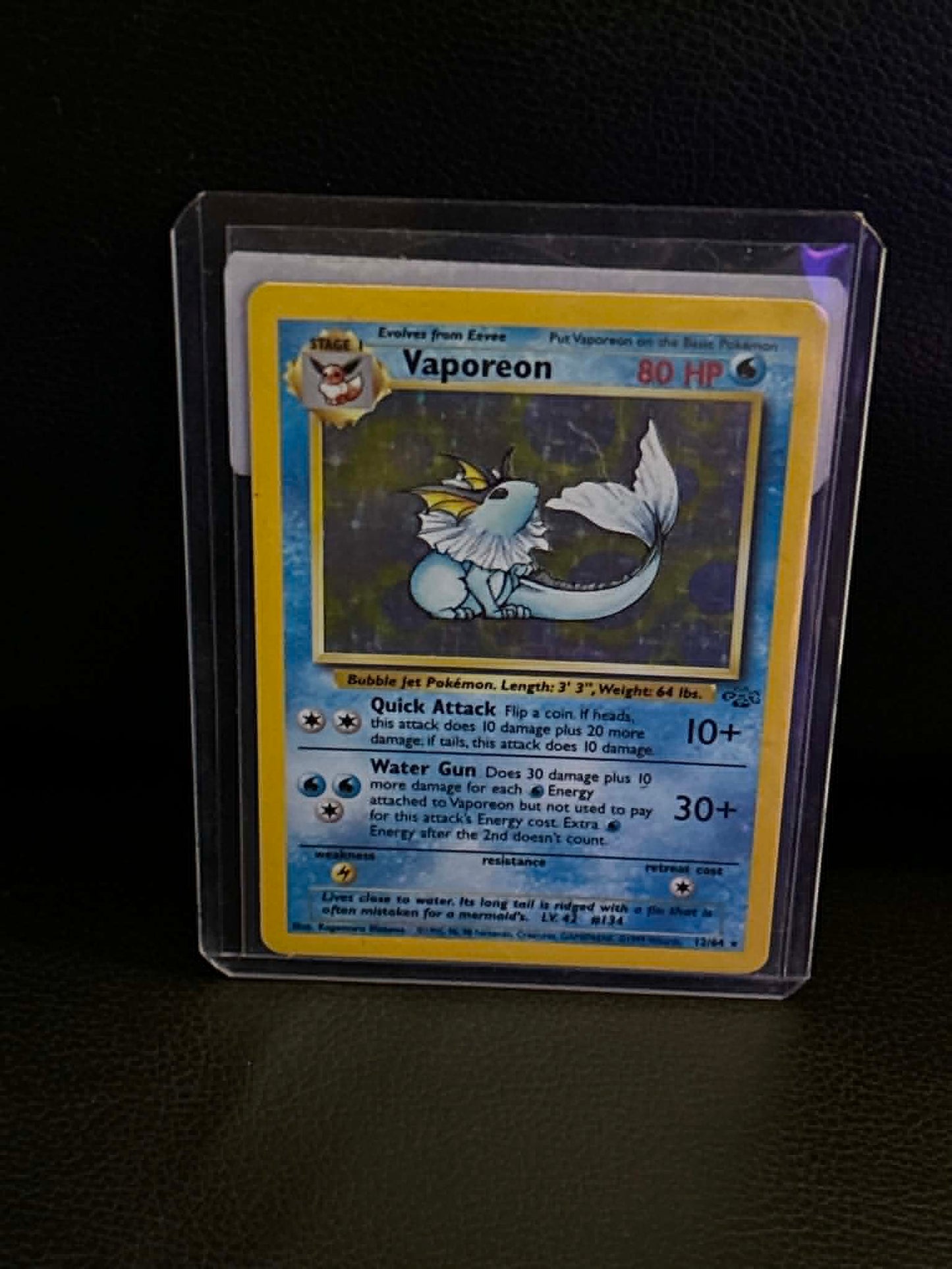 Vaporeon (12) 12/64 Jungle Holo Rare Pokemon Unlimited Holofoil Lightly Played English Trading Card