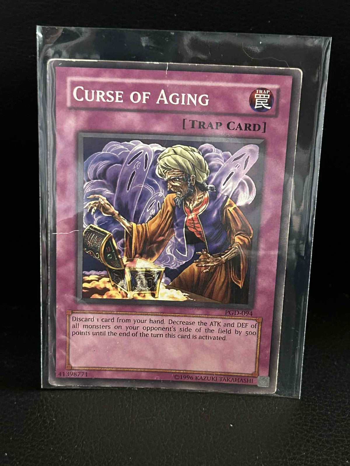 Curse of Aging - PGD-094 - Common - Unlimited Edition Pharaonic Guardian Yu-Gi-O