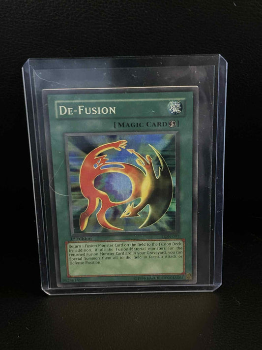 De-Fusion - LON-097 - Super Rare - 1st Edition Labyrinth of Nightmare Yu-Gi-Oh!