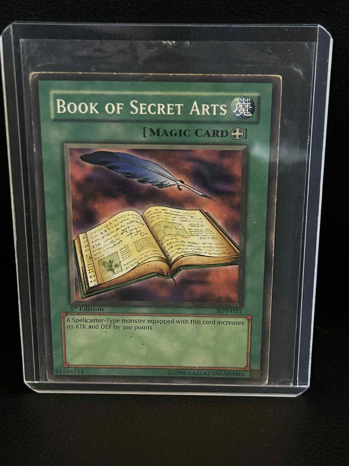 Book of Secret Arts - SDY-021 - Common - 1st Edition Starter Deck: Yugi Yu-Gi-Oh