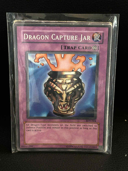Dragon Capture Jar - SDY-044 - Common - Unlimited Edition Starter Deck: Yugi Yu-