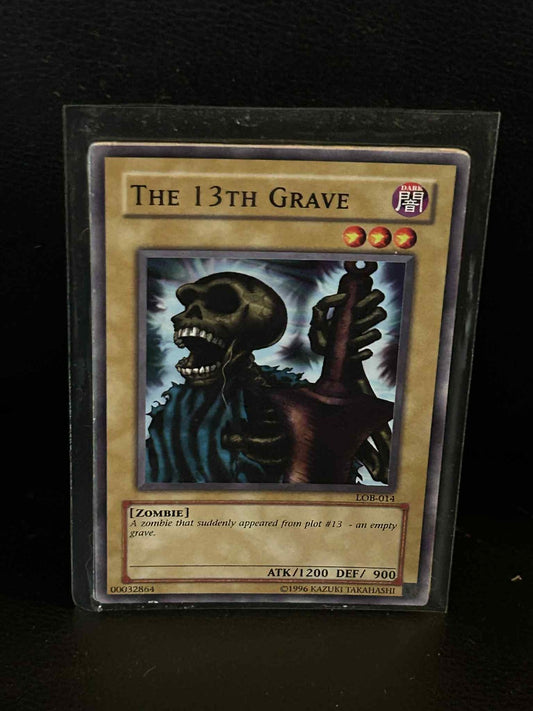 The 13th Grave - LOB-014 - Common - Unlimited Edition Legend of Blue Eyes White