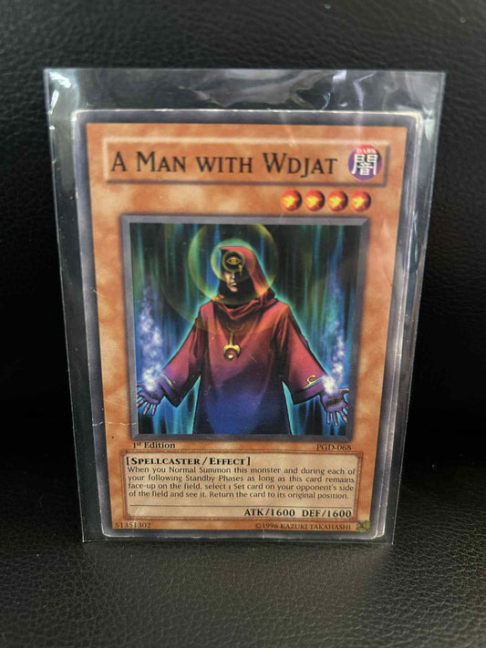 A Man with Wdjat - PGD-068 - Common - 1st Edition Pharaonic Guardian Yu-Gi-Oh!