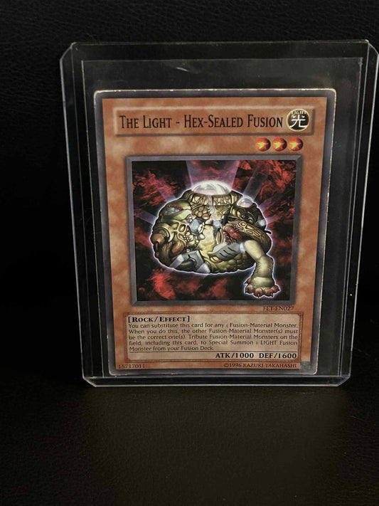The Light - Hex-Sealed Fusion - FET-EN027 - Common - Unlimited Edition Flaming E