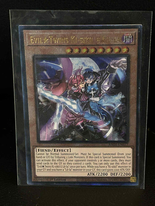 EvilTwins Ki-sikil & Lil-la - RA04-EN037 - Ultimate Rare - 1st Edition Quarter C
