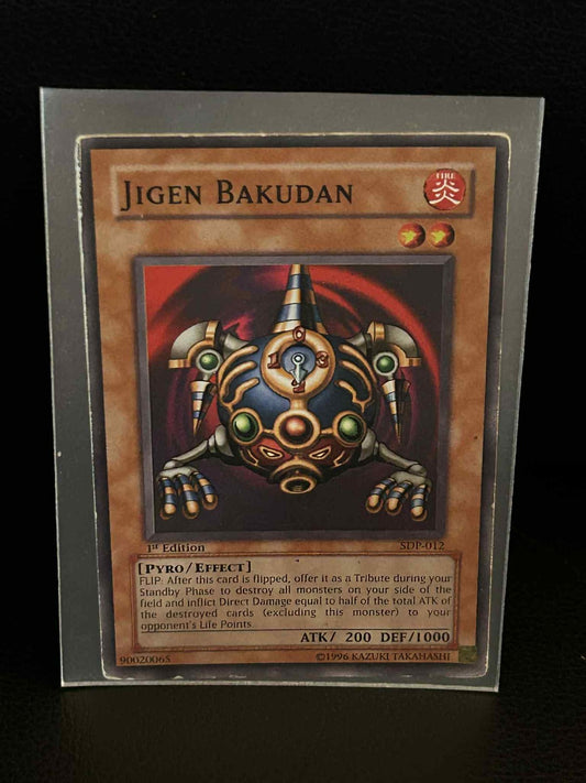 Jigen Bakudan - SDP-012 - Common - 1st Edition Starter Deck: Pegasus Yu-Gi-Oh!