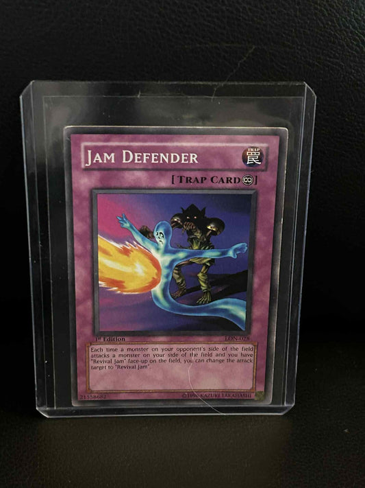 Jam Defender - LON-028 - Common - 1st Edition Labyrinth of Nightmare Yu-Gi-Oh!