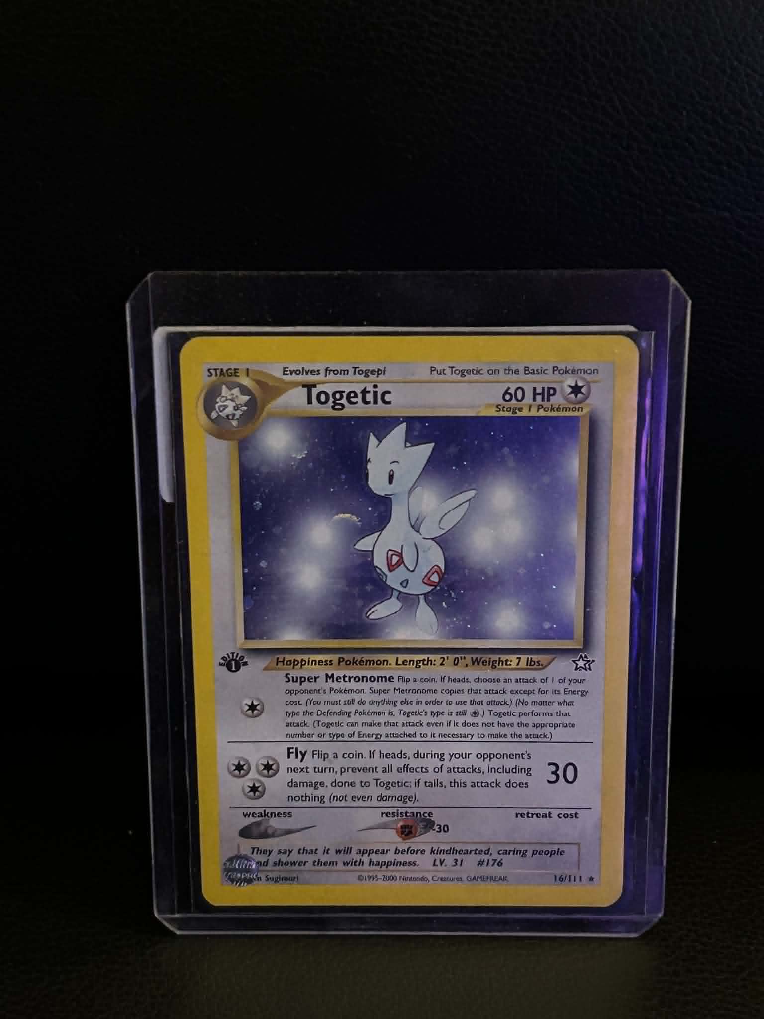 Togetic 016/111 Neo Genesis Holo Rare Pokemon 1st Edition Holofoil Lightly Played English Trading Card